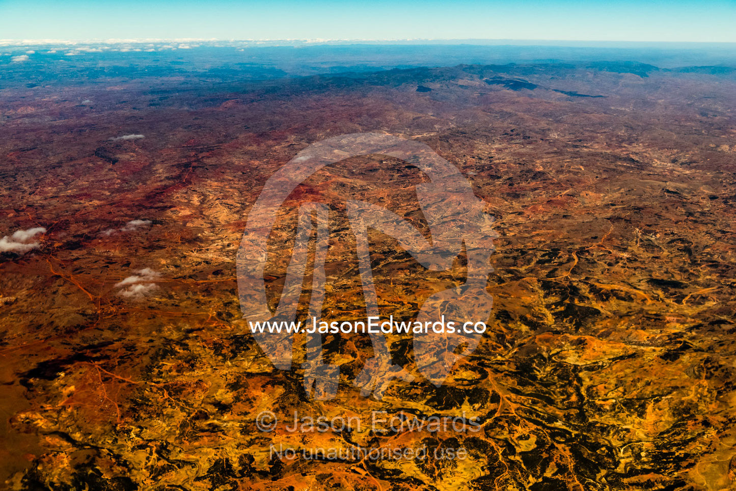 An aerial view of massive deforestation and resultant soil erosion on the mountains and plains of Madagascar. Antananarivo, Madagascar