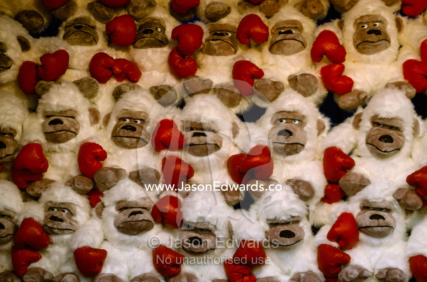 Rows of toy gorillas in a sideshow stall. Victoria, Australia.