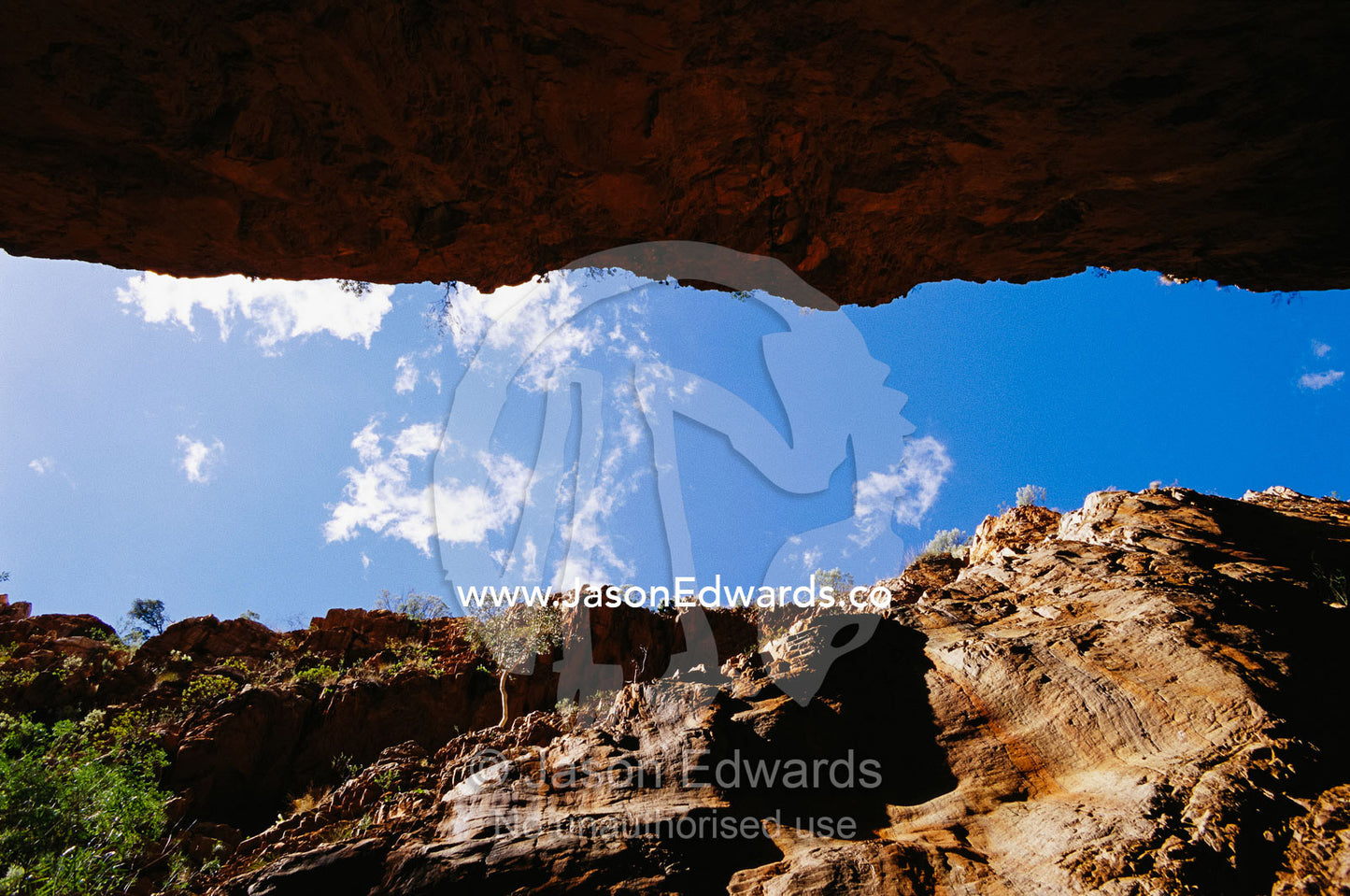 Gorge wall skyline with view to blue sky. Simpsons Cap, Northern Territory, Australia.