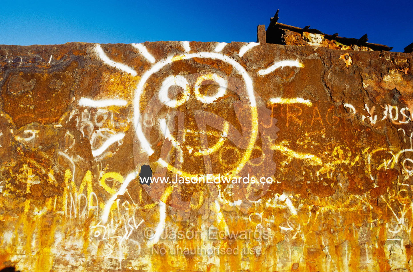 Graffiti painted on a rusting ship. Great Sandy National Park, Cooloola, Queensland, Australia.