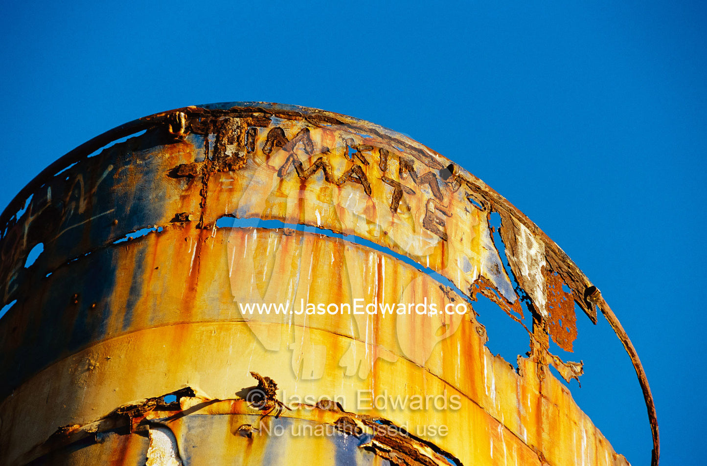 Graffiti on a rusting ship. Great Sandy National Park, Cooloola, Queensland, Australia.