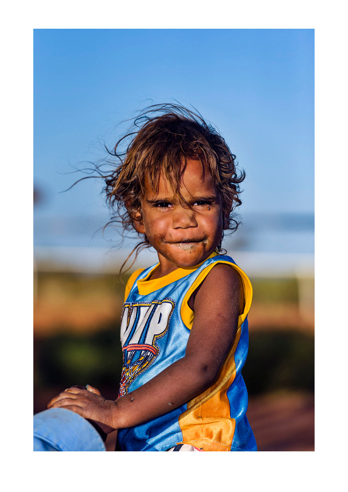 There are times when you come across a human face that speaks beyond the years of its owner; a face born of community forged over countless millennia. And then sometimes it’s just smiles emanating joy from a child. Ntaria, Hermannsburg, Northern Territory, Australia.
