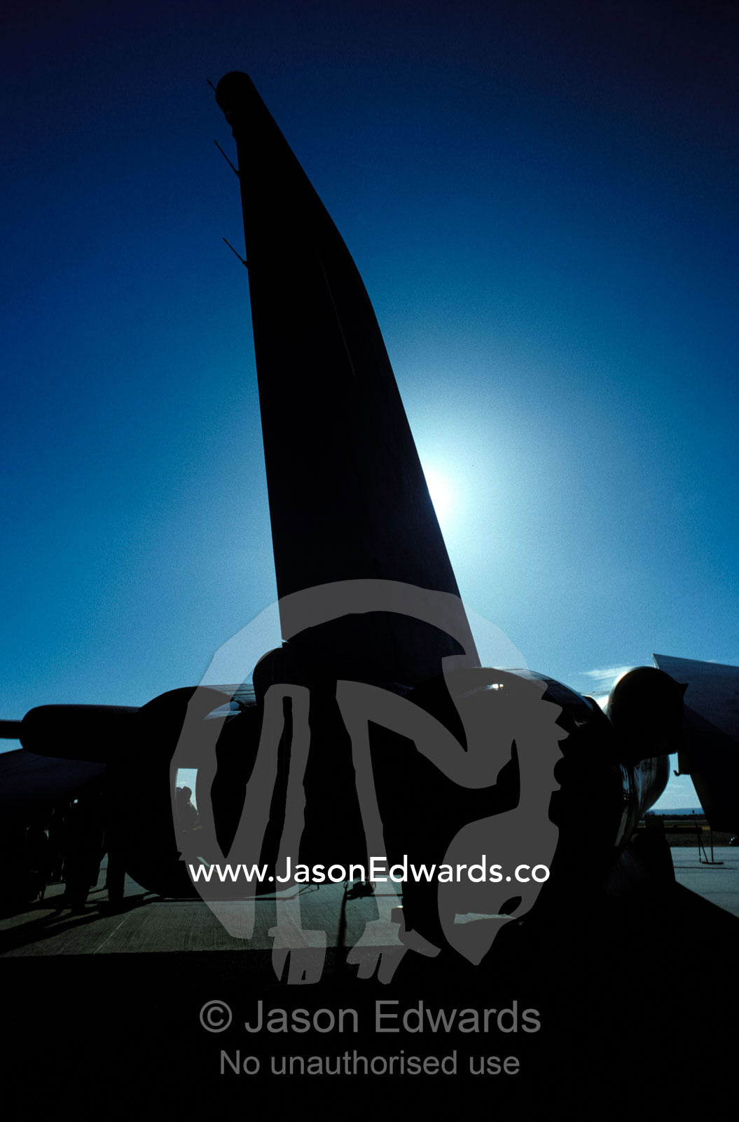 A menacing F111 jet fighter bomber tail wing silhouette. Avalon International Airshow, Victoria Australia