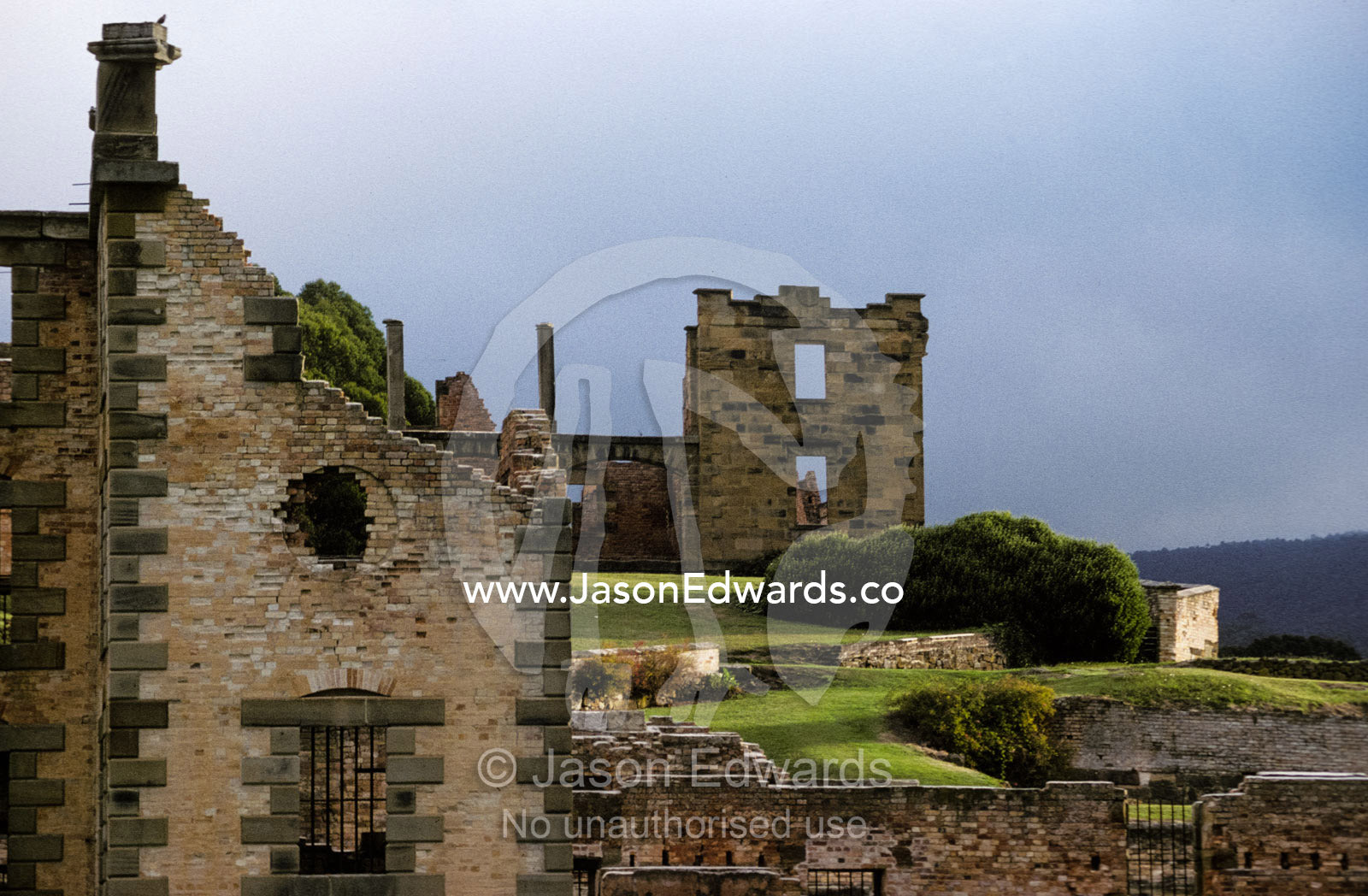 Barred windows and stone ruins at Port Arthur convict penal colony. Port Arthur Penal Settlement Tasmania Australia.