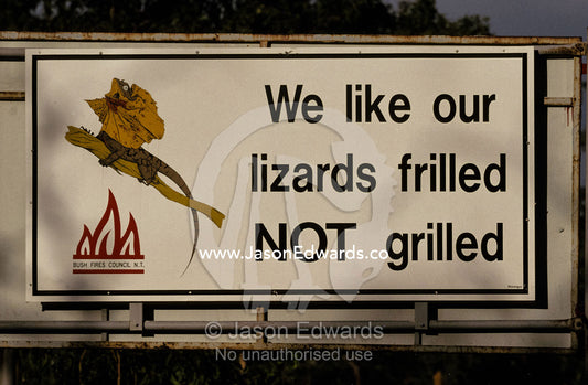 Bush fire conservation road sign protects the Frilled Lizards habitat. Kimberley Ranges National Park, Western Australia.