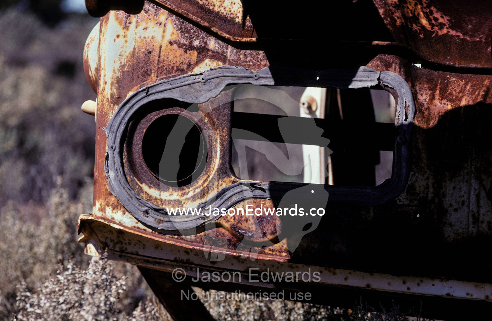 An abandoned antique truck wreck rusting away in the baking desert. Konalda Station, Nullabor Plain, South Australia.