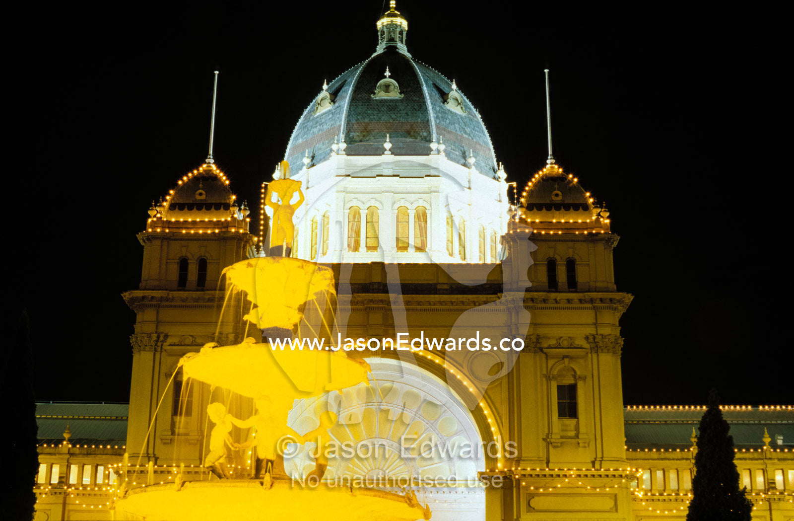 World Heritages Listed Royal Exhibiton Buildings and Gardens at night. Carlton Gardens Victoria Australia.