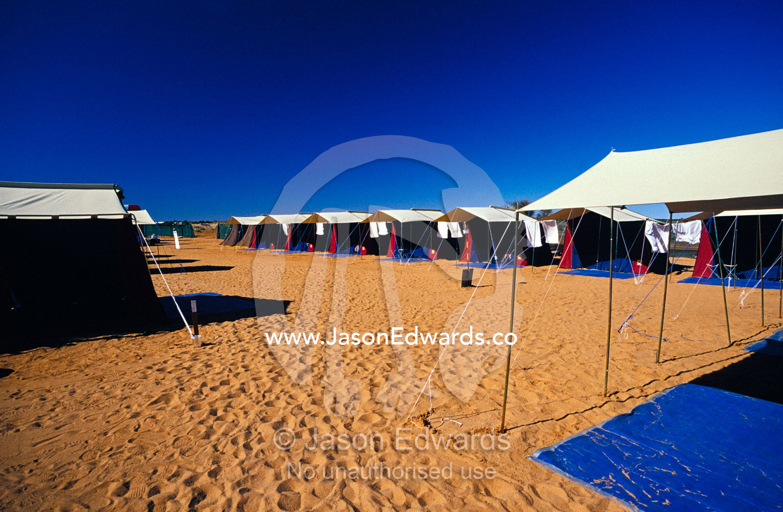 Outback desert tent city erected by tourists near Lake Eyre in flood. Oodnadatta, Willian Creek, South Australia.