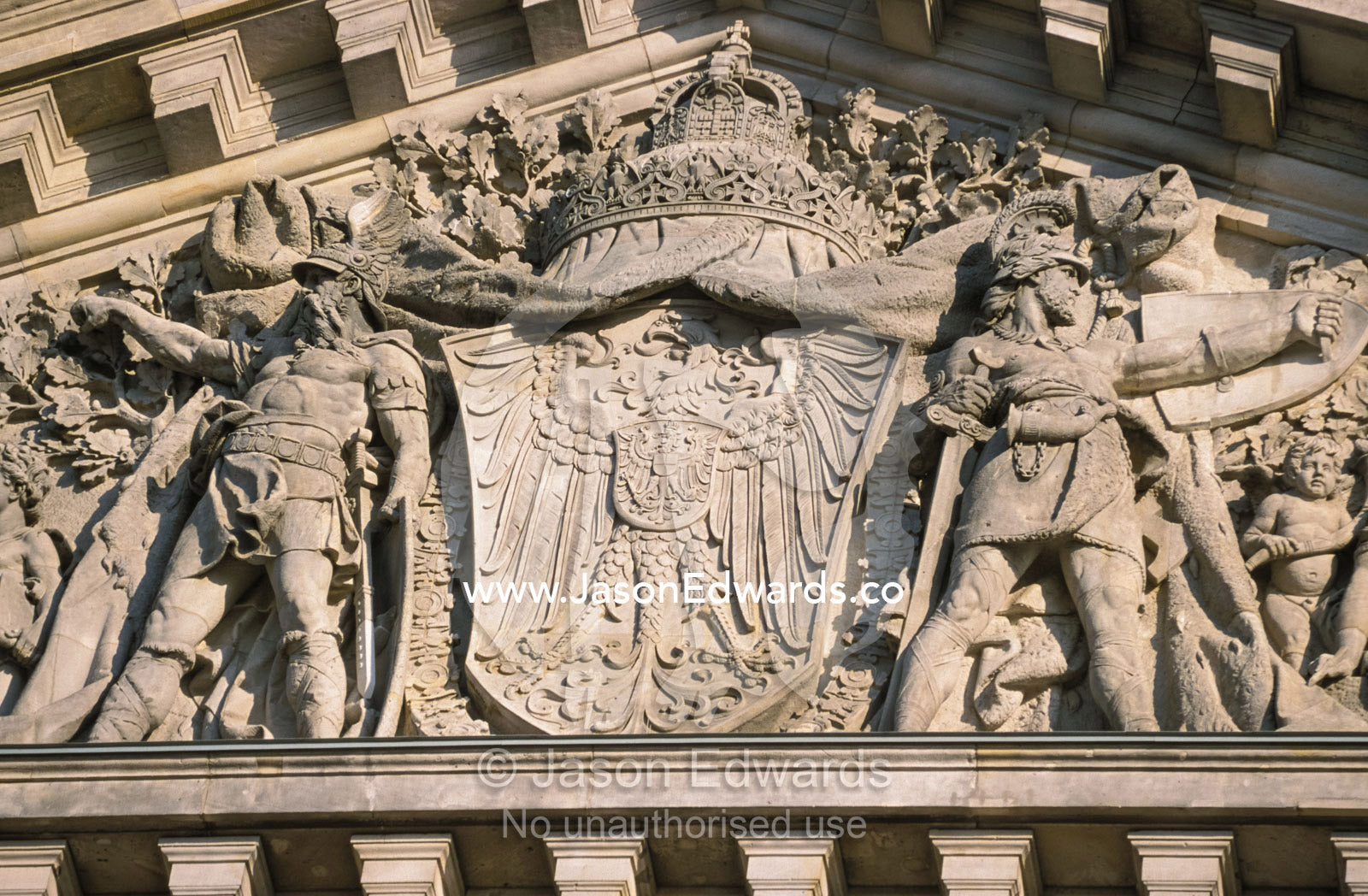Historical sculpture of soldiers in battle on the New Reichstag facade Berlin, Brandenburg, Germany.