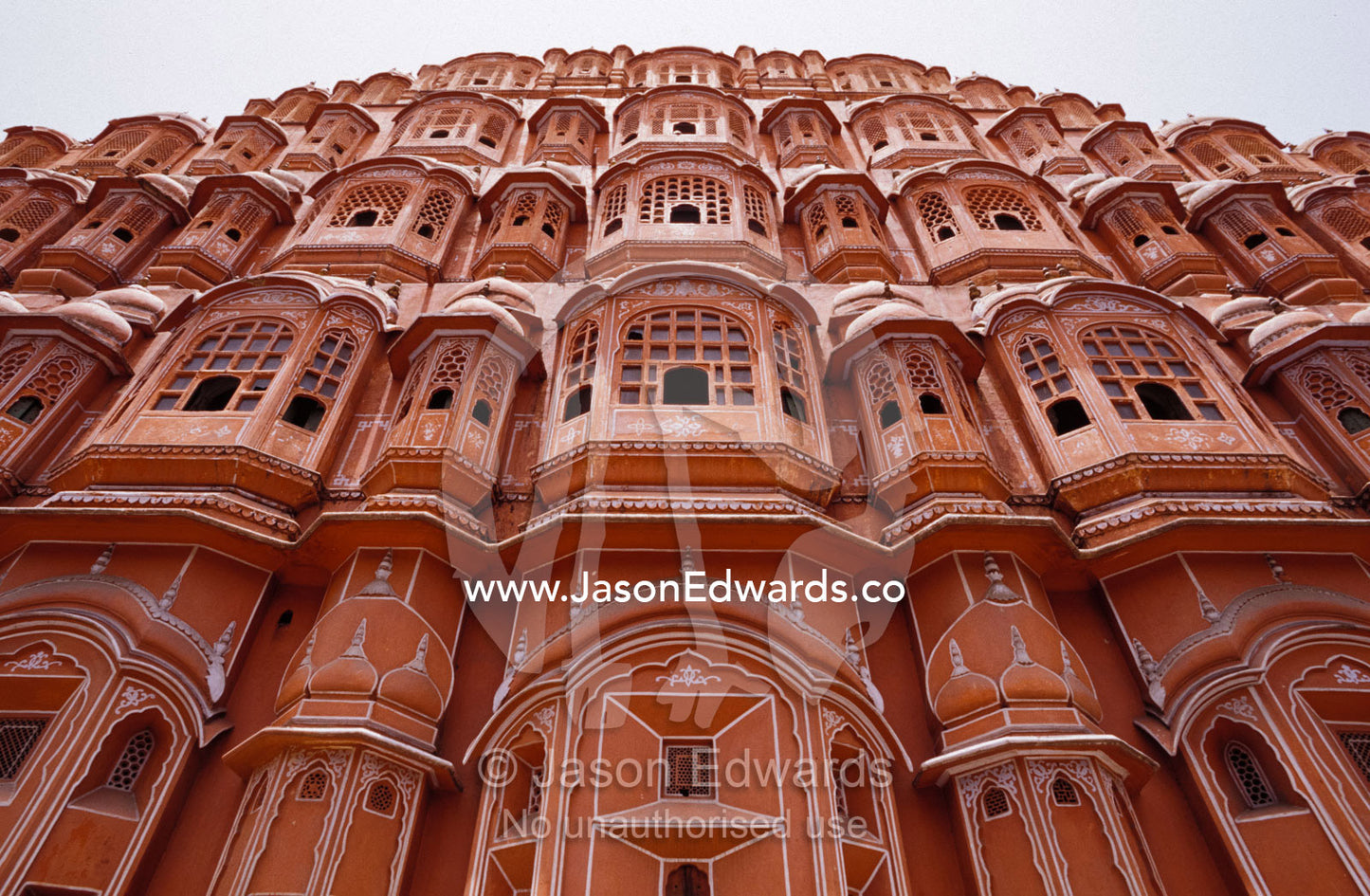 The Hawa Mahal, Palace of the Winds, Pink Palace's sandstone windows. Jaipur, India.