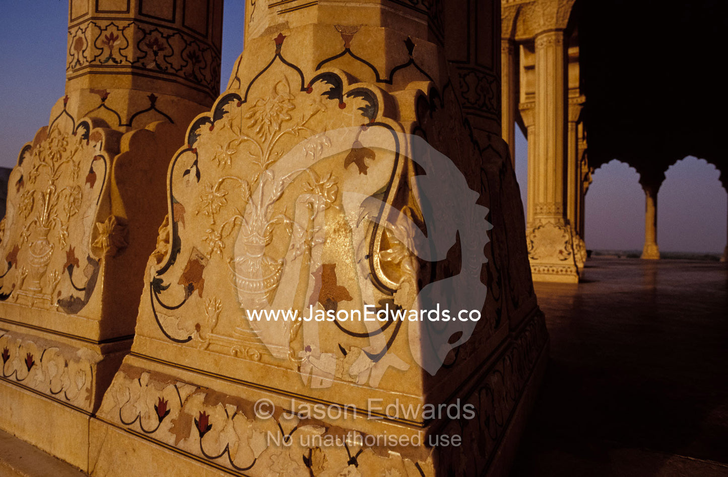 Historical marble columns with Pietra Dura inlay at the Agra Fort. Agra, India.