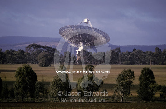 A giant Radio Telescope surrounded by farmland. Parkes, New South Wales, Australia.