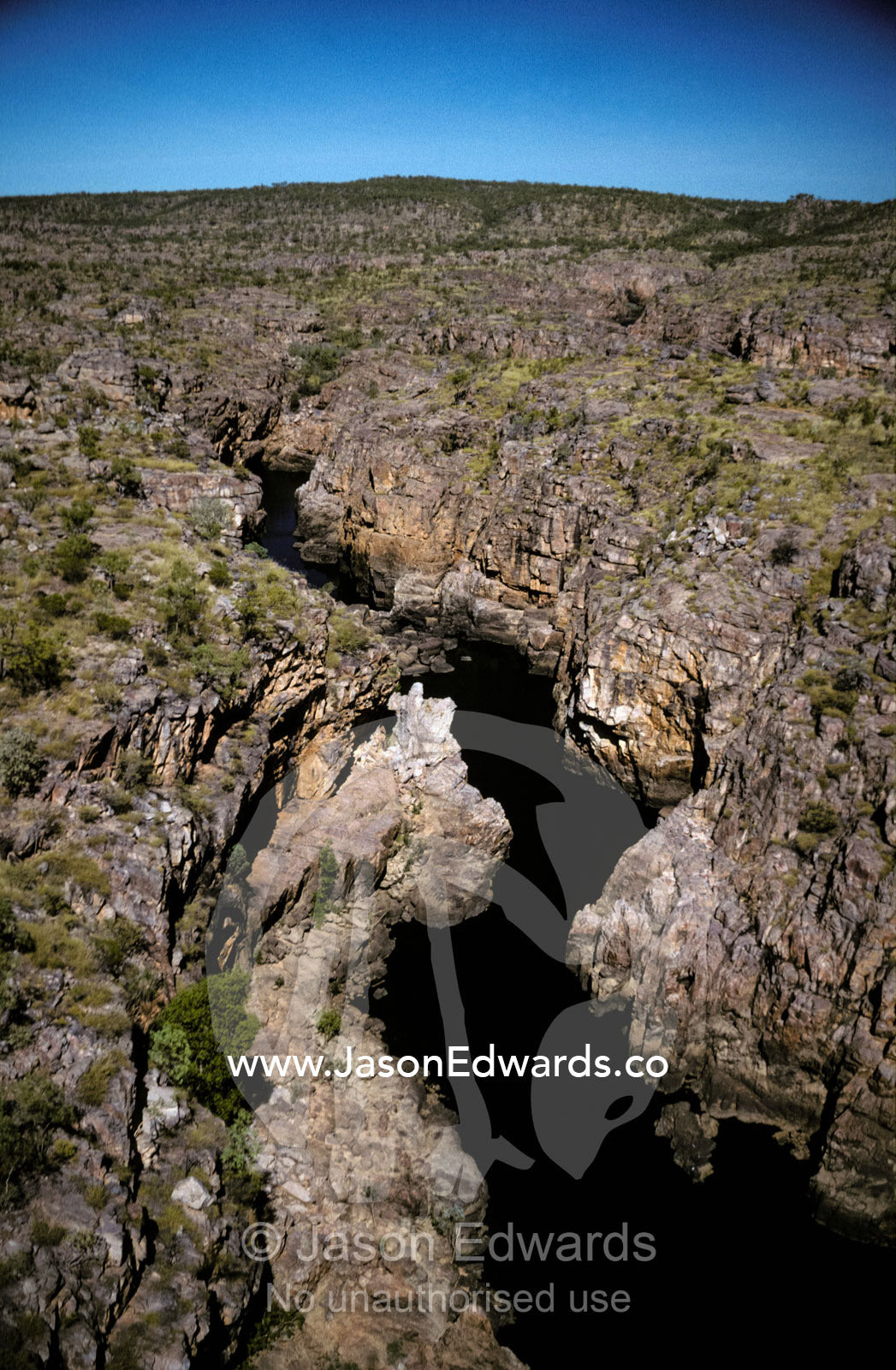 An aerial view of an arid rugged desert canyon gorge in the Top End. Katherine Gorge, Nitmiluk National Park, Northern Territory, Australia.