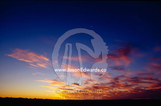 A specactular sunset and cloud formation over a vast desert plain. Simpson Desert Conservation Park, South Australia.