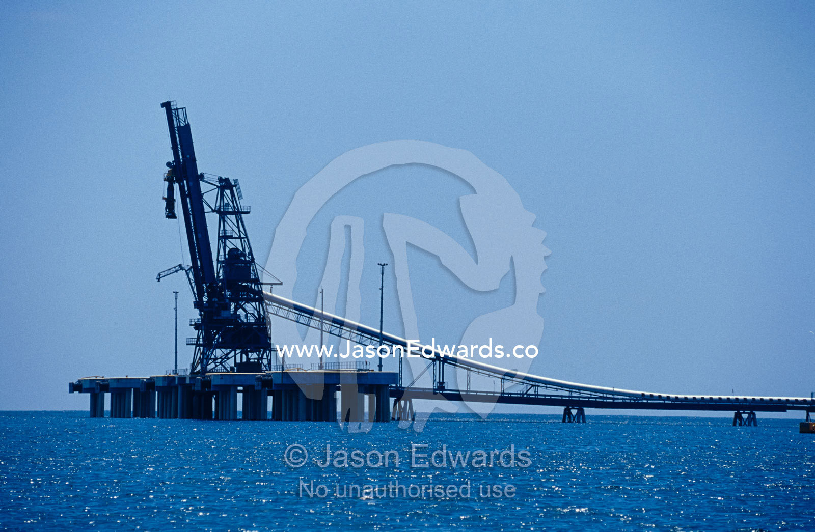 A logging woodchip pulp Plant for loading ships for transportation. Twofold Bay, Eden, New South Wales, Australia.
