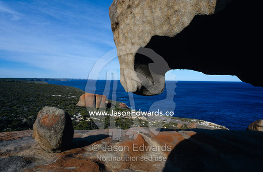 Orange Lichen on rocks and granite erosion in abstract formations. Kangaroo Island, South Australia.