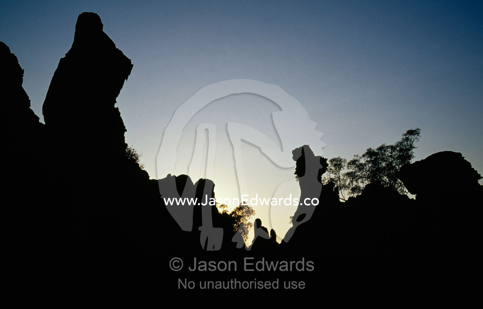 Silhouetted ancient "Lost City" sandstone rock formations. Limmen National Park, Northern Territory, Australia.