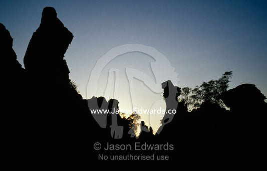 Silhouetted ancient "Lost City" sandstone rock formations. Limmen National Park, Northern Territory, Australia.