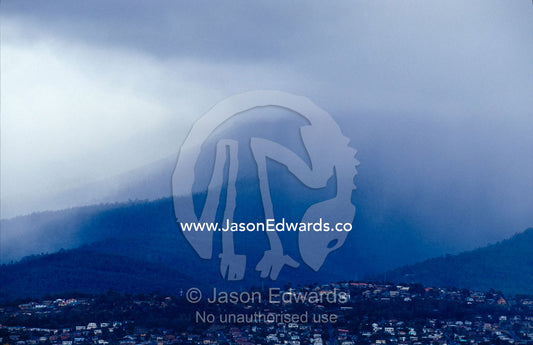 torrential storm clouds envelope Hobart and Mount Wellington Hobart, Tasmania, Australia.