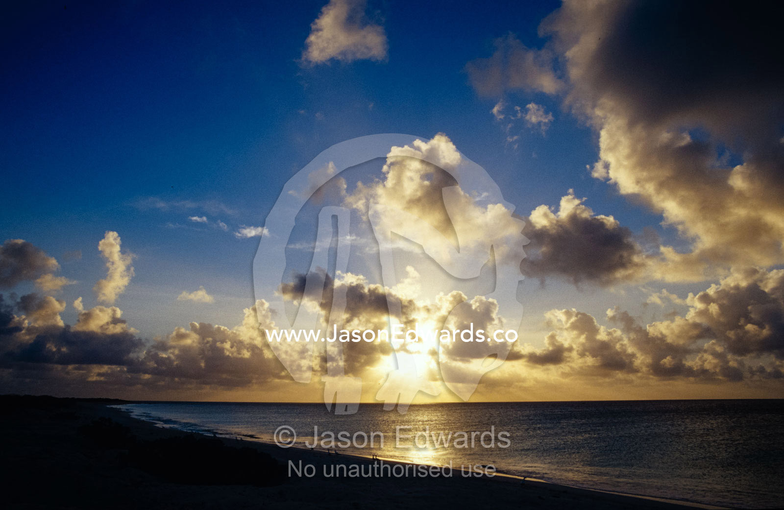 sunset storm clouds over tropical island beach East Diamond Island, Coral Sea Island Territory, Australia