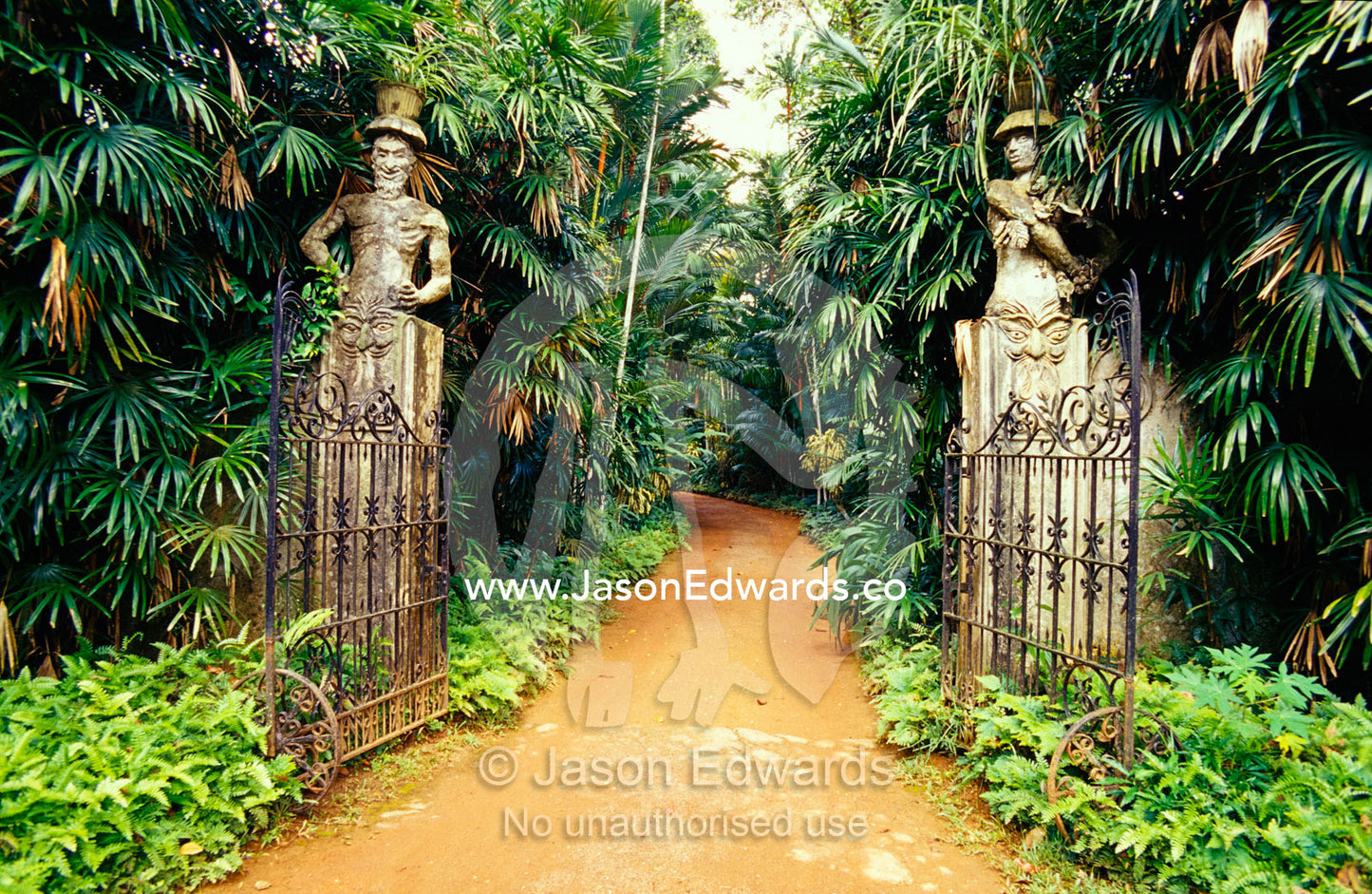 Imposing gates lead to the home of the late architect Geoffrey Bawa. Geoffrey Bawa, Lunuganga Residency, Sri Lanka.
