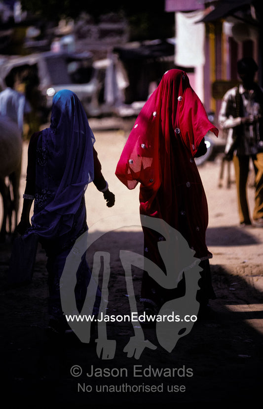 women in street colourful dress silk sari Mandawa, Rajasthan, India.