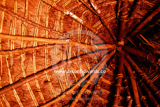A detail of the inside of the thatched roof of an African mud hut. Tororo District, Uganda.