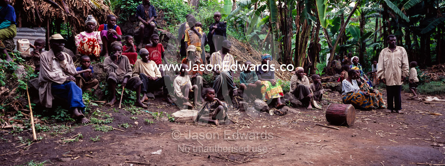 Displaced Batwa Forest people, pygmy, living in a banana plantation. Kisoro District, Western Uganda.