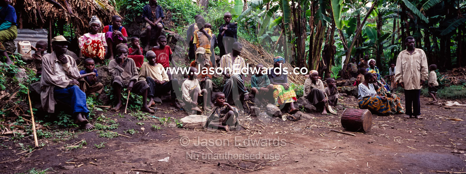 Displaced Batwa Forest people, pygmy, living in a banana plantation. Kisoro District, Western Uganda.