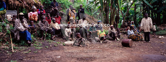 Displaced Batwa Forest people, pygmy, living in a banana plantation. Kisoro District, Western Uganda.