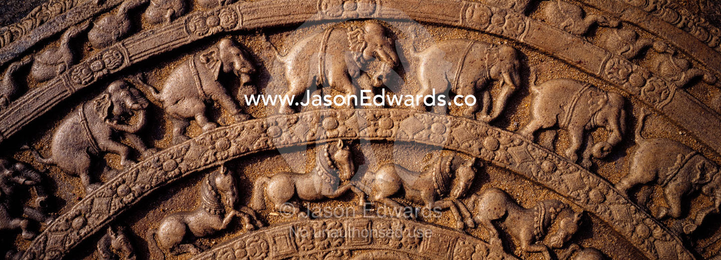 Ancient carvings in Moonstones often depict Elephants and horses. Polonnaruwa Ancient City,  Sri Lanka.