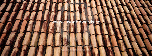The neat, textured terracotta tiles of a coastal resort roof. Negombo Beach, Sri Lanka.