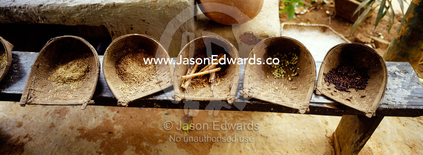 Herbs and spices in a spice garden served in traditional wicker scoops Matale, Sri Lanka.