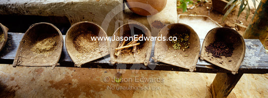 Herbs and spices in a spice garden served in traditional wicker scoops Matale, Sri Lanka.
