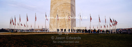 The American flag, Old Glory, flies near the Washington Monument. Washington DC, USA, United States of America.