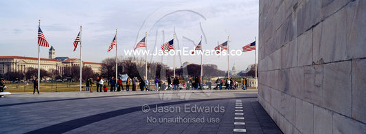 The American flag, Old Glory, flies near the Washington Monument. Washington DC, USA, United States of America.