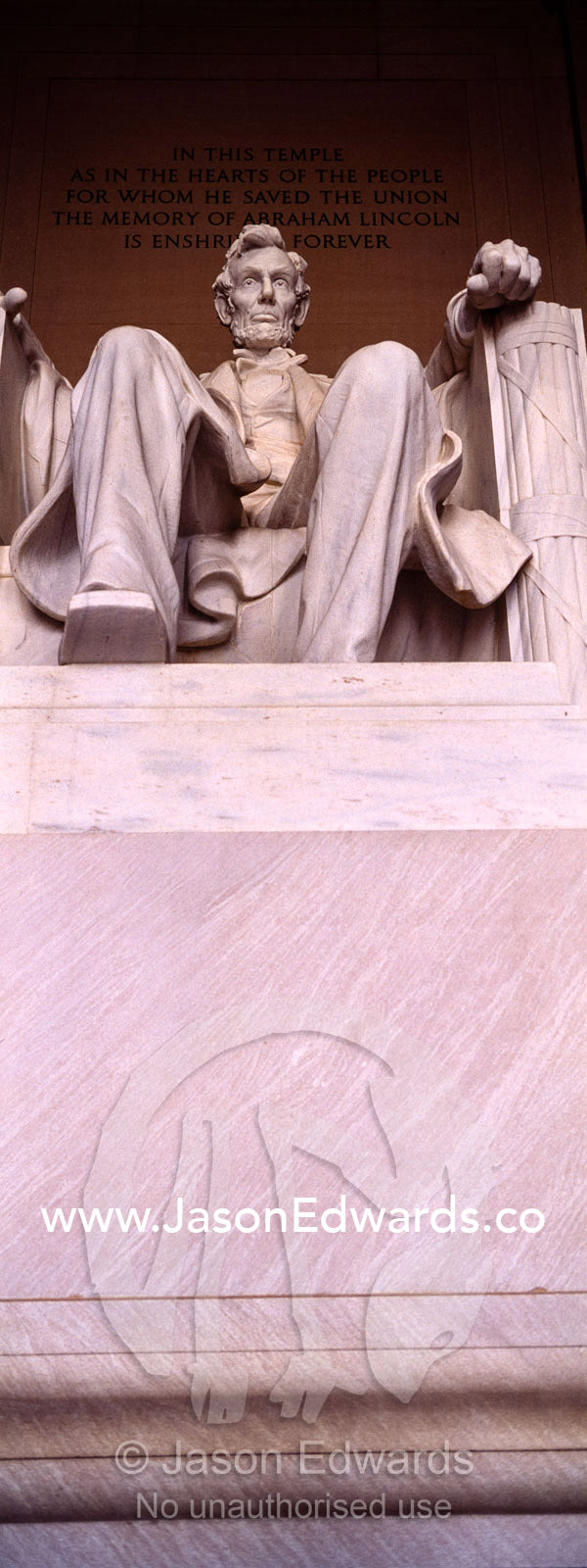 A statue of Abraham Lincoln sits proudly in the Lincoln Memorial. Washington DC, USA, United States of America.