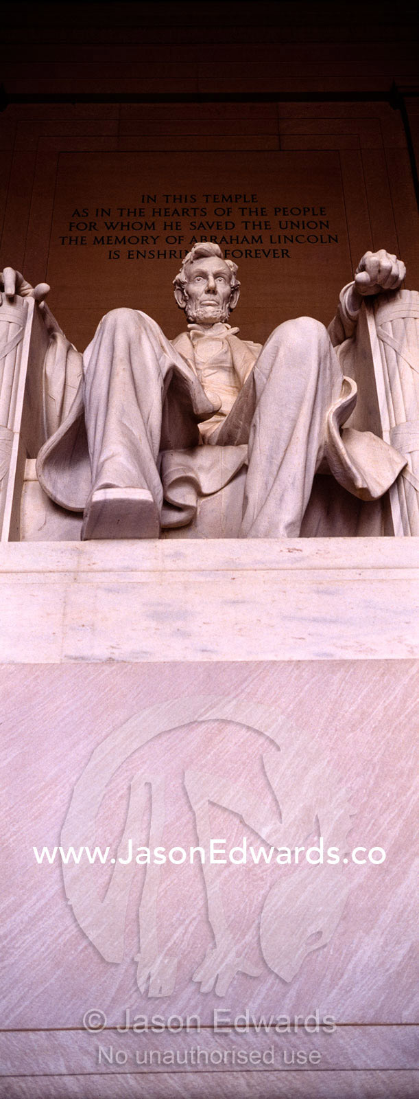 A statue of Abraham Lincoln sits proudly in the Lincoln Memorial. Washington DC, USA, United States of America.