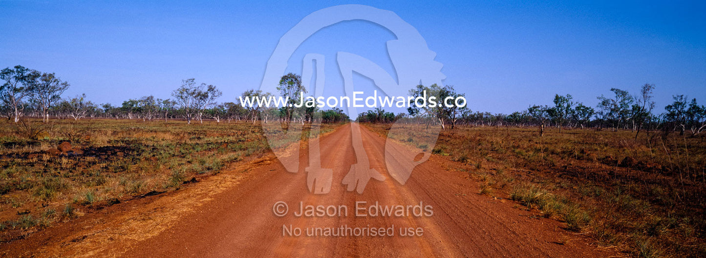 A remote dusty, red track running through Australia s Top End. Limmen National Park, Northern Territory, Australia.