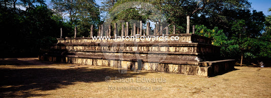 Audience Hall ruins with a frieze of carved elephants at Polonnaruwa. Polonnaruwa Ancient City, Sri Lanka.