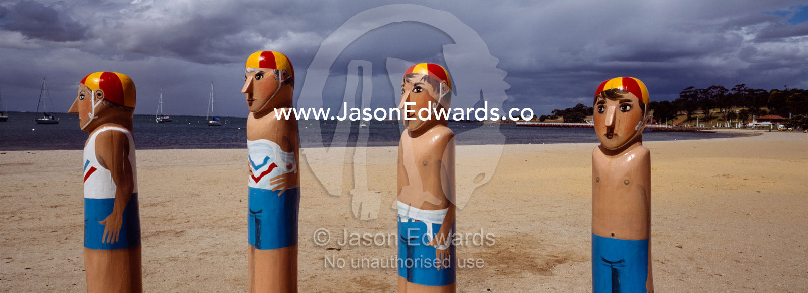A public sculpture depicting Australian lifesavers on a foreshore. Geelong, Victoria, Australia.