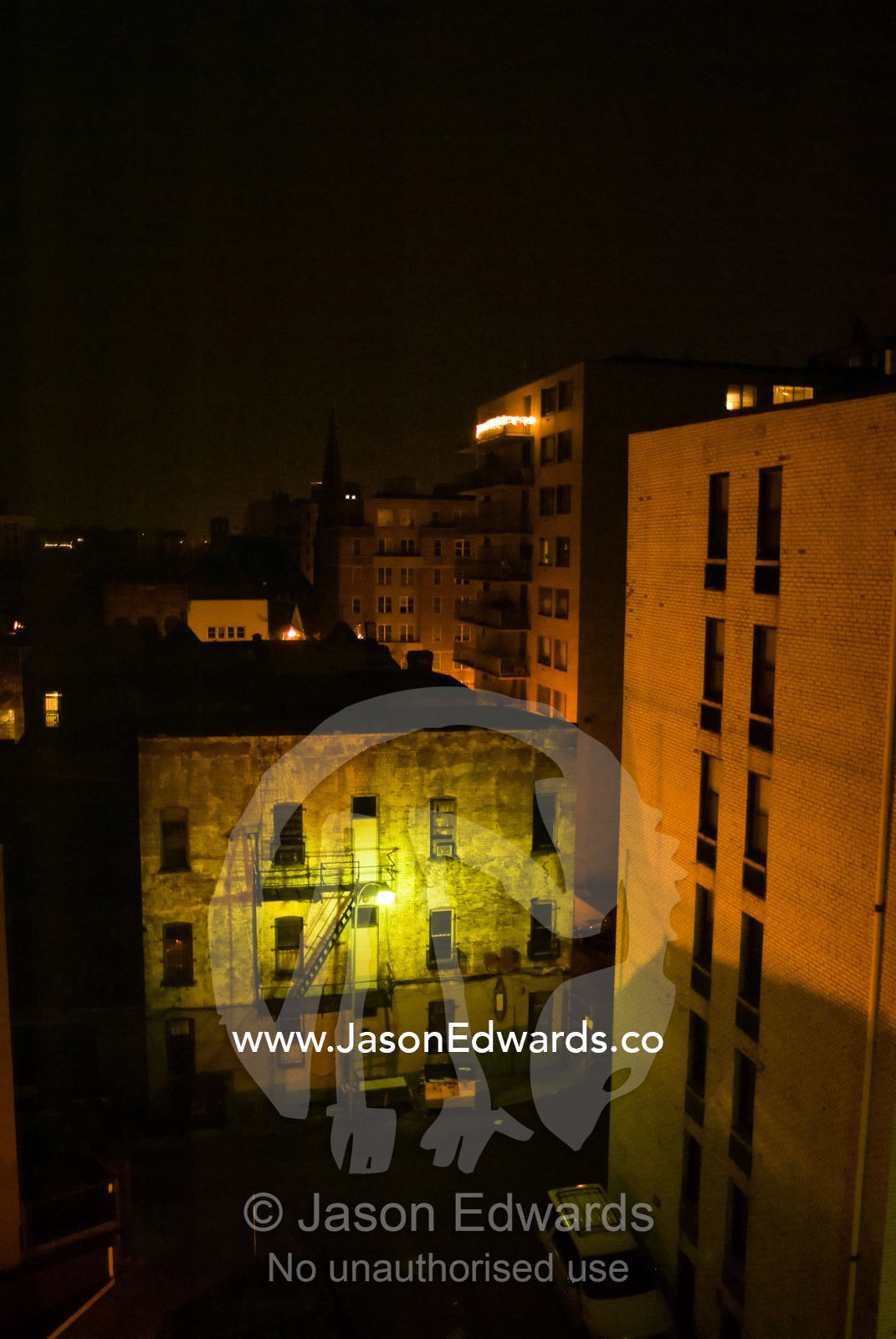 Nighttime in an alley at the rear of a hotel in downtown Washington. Washington, DC, United States of America.