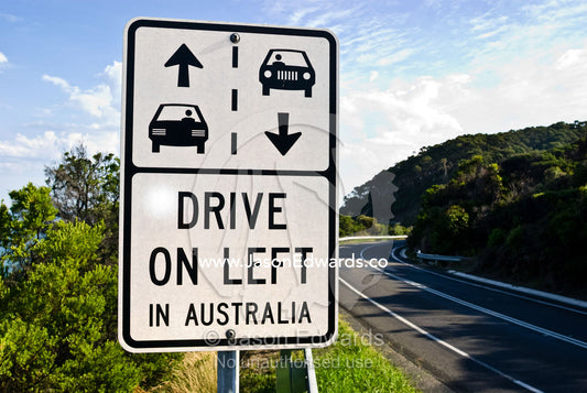 Signage reminding drivers of the correct driving laws in Australia. Great Ocean Road, Victoria, Australia.