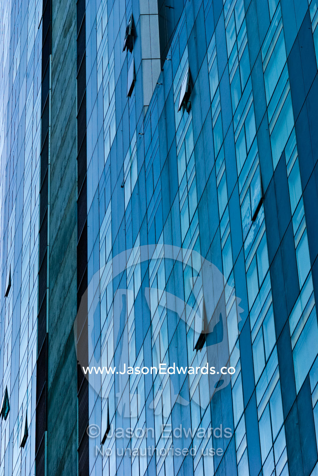 Myriad glass panels make up the windows in an immense office building. Melbourne, Victoria, Australia.