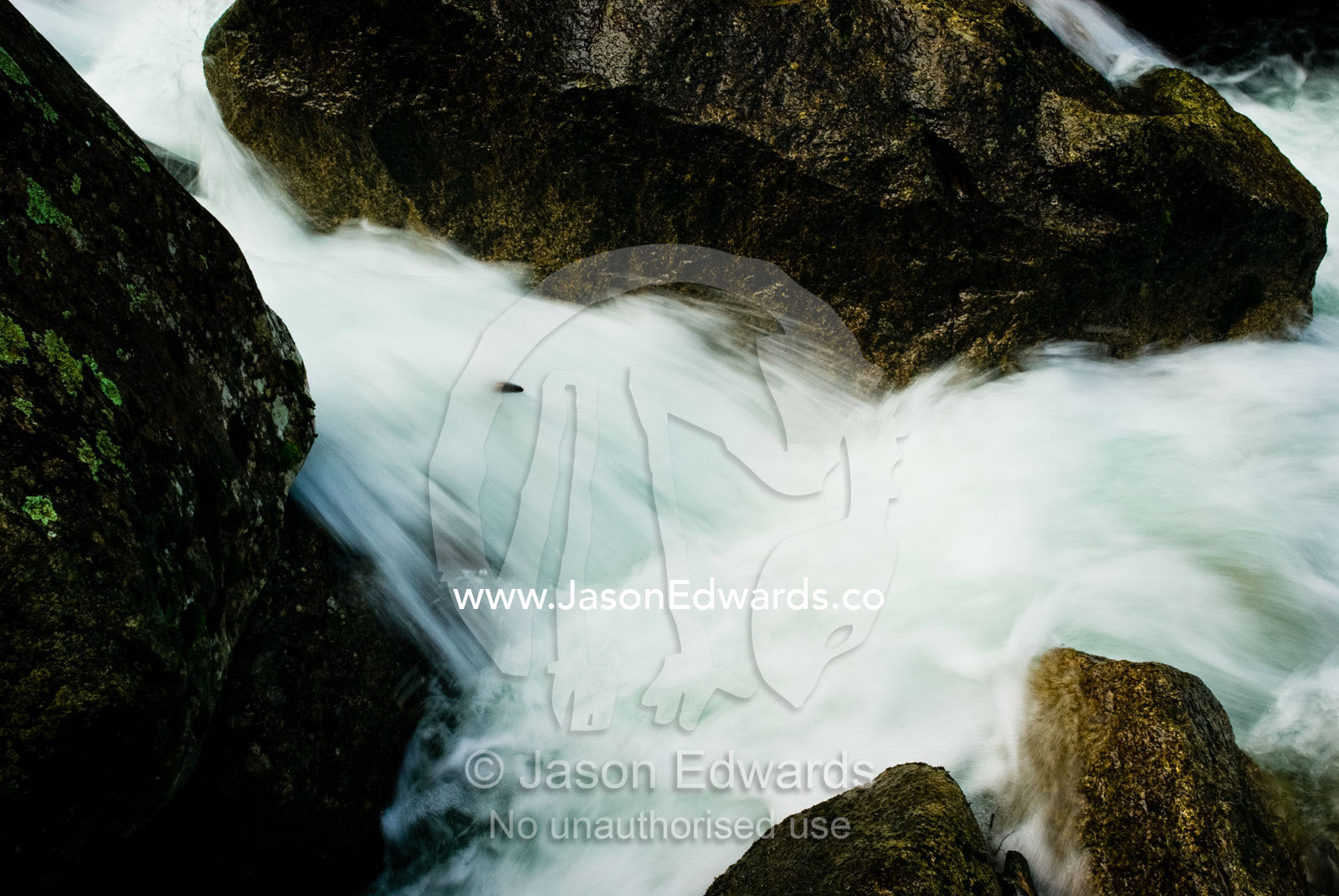 The Ovens River cascading over granite boulders on Mount Buffalo. Mount Buffalo National Park, Victoria, Australia.