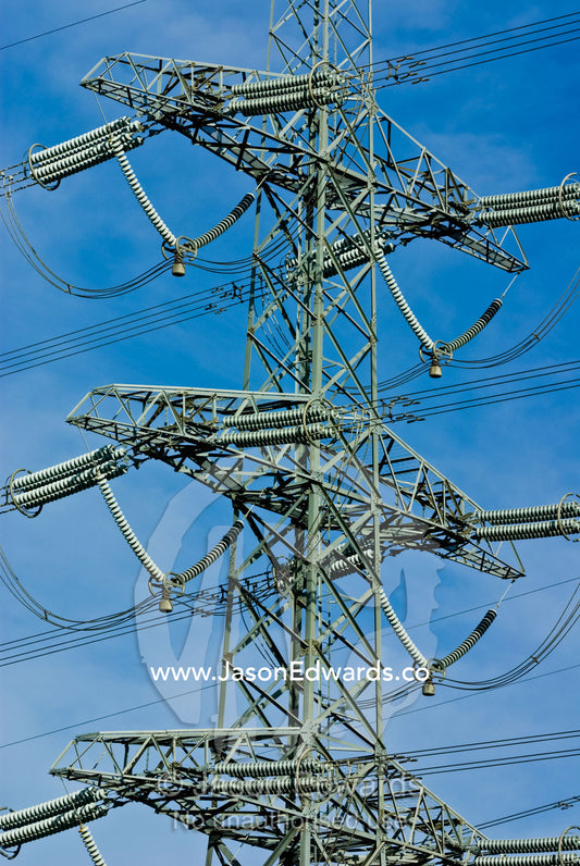High voltage power lines on a massive steel tower carry electricity. Ringwood, Victoria, Australia.