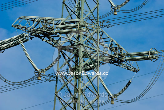 High voltage power lines on a massive steel tower carry electricity. Ringwood, Victoria, Australia.