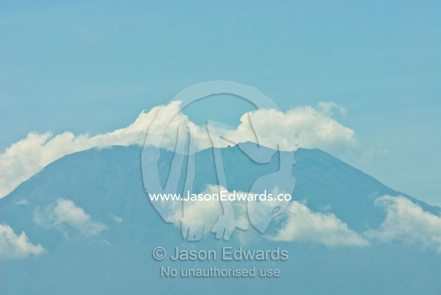 The cone of the stratovolcano Gunung Agung the highest point in Bali. Gunung Agung, Bali, Indonesia.