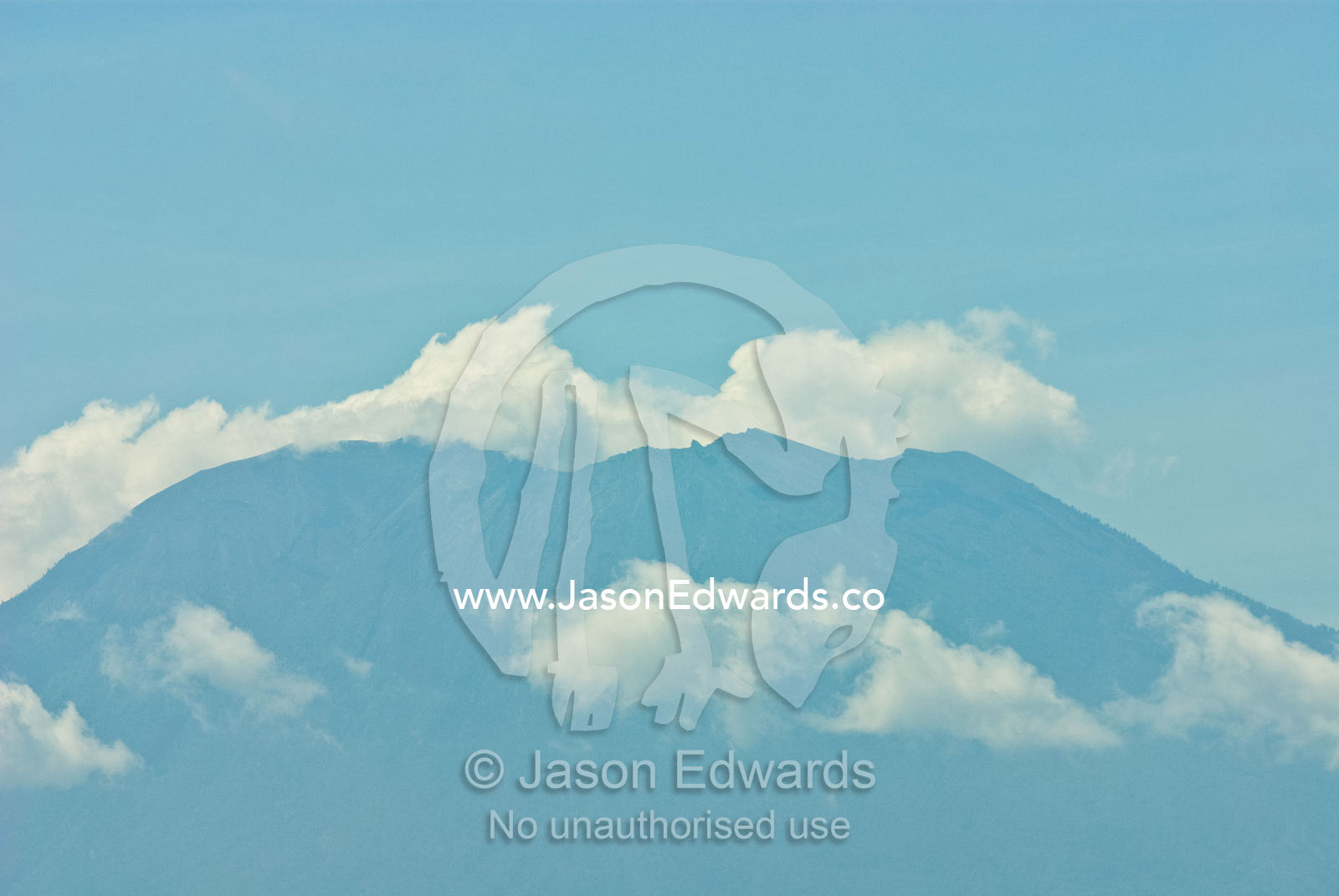 The cone of the stratovolcano Gunung Agung the highest point in Bali. Gunung Agung, Bali, Indonesia.