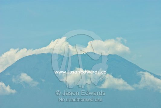 The cone of the stratovolcano Gunung Agung the highest point in Bali. Gunung Agung, Bali, Indonesia.